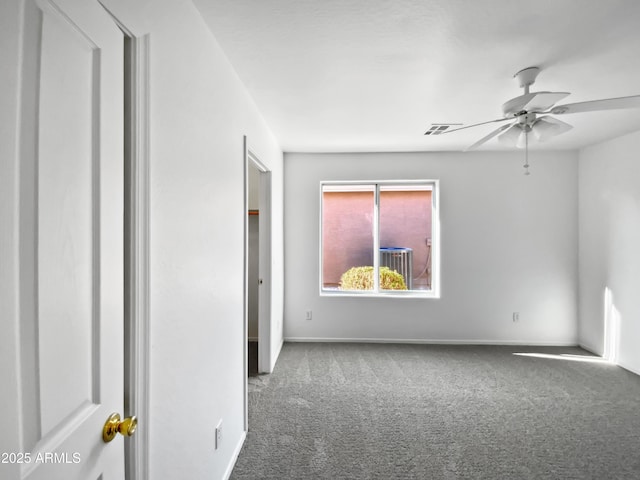 unfurnished room with carpet flooring and ceiling fan