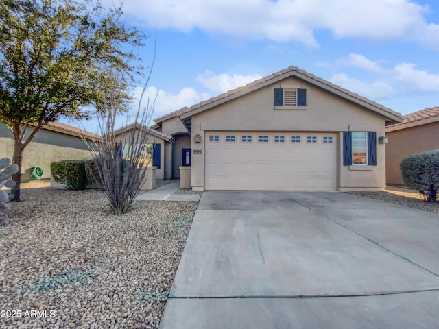 ranch-style house featuring a garage