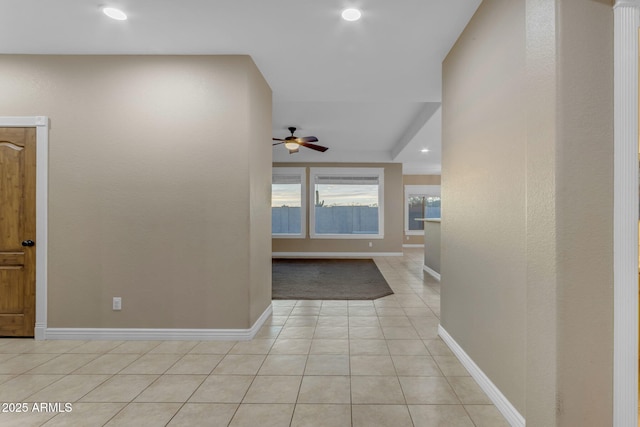 hall with light tile patterned flooring