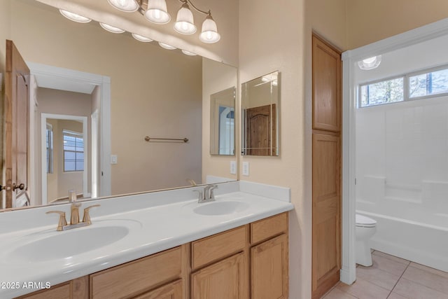 full bathroom with vanity, toilet, bathing tub / shower combination, and tile patterned flooring