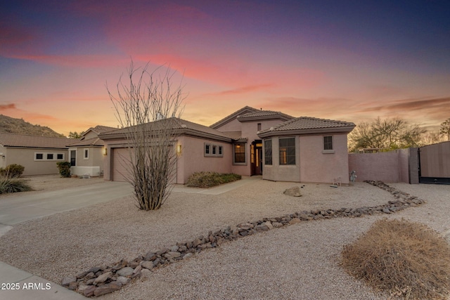 view of front of property with a garage