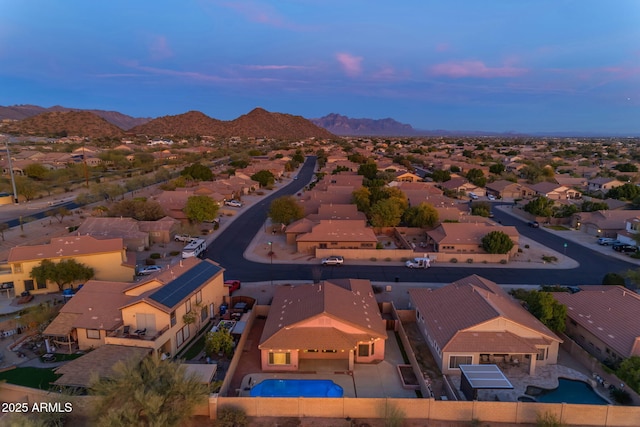 aerial view at dusk with a mountain view