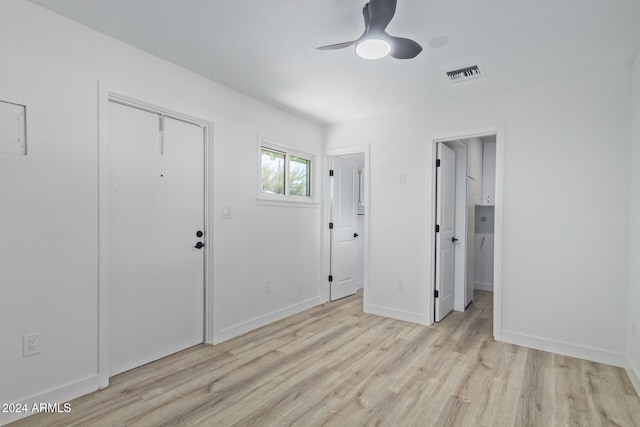 interior space with light hardwood / wood-style floors and ceiling fan