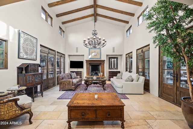 living room featuring high vaulted ceiling, beamed ceiling, and a chandelier