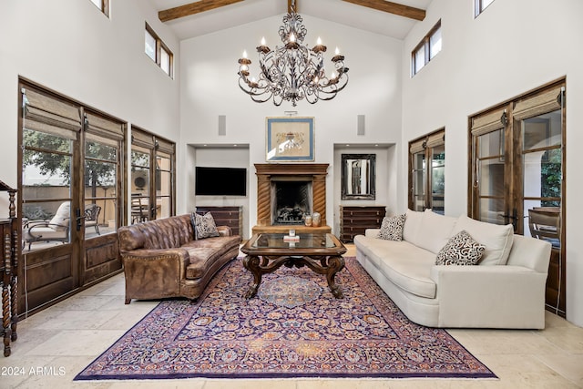 living room with high vaulted ceiling, beamed ceiling, and an inviting chandelier