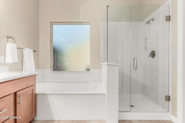 7630 E Knoll St, Mesa, AZ 85207 - full bath featuring a stall shower, a garden tub, and vanity