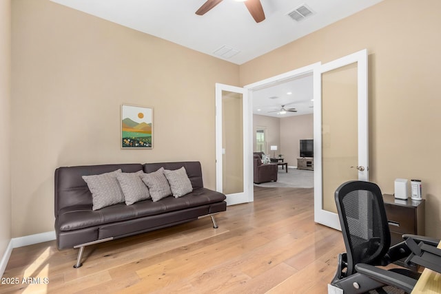 7630 E Knoll St, Mesa, AZ 85207 - home office featuring wood finished floors, a ceiling fan, visible vents, baseboards, and french doors