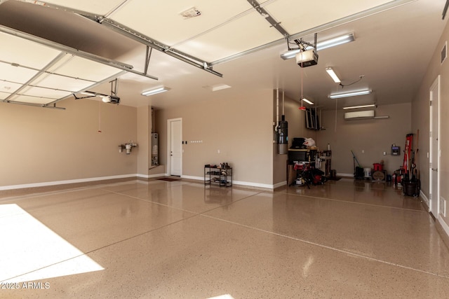7630 E Knoll St, Mesa, AZ 85207 - garage featuring baseboards, visible vents, and a garage door opener
