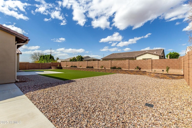 7630 E Knoll St, Mesa, AZ 85207 - view of yard featuring a fenced backyard and a patio
