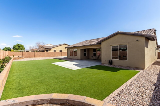 7630 E Knoll St, Mesa, AZ 85207 - back of property featuring a patio, a fenced backyard, a tile roof, a yard, and stucco siding