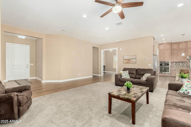7630 E Knoll St, Mesa, AZ 85207 - living area with light wood-style floors, visible vents, a ceiling fan, and recessed lighting