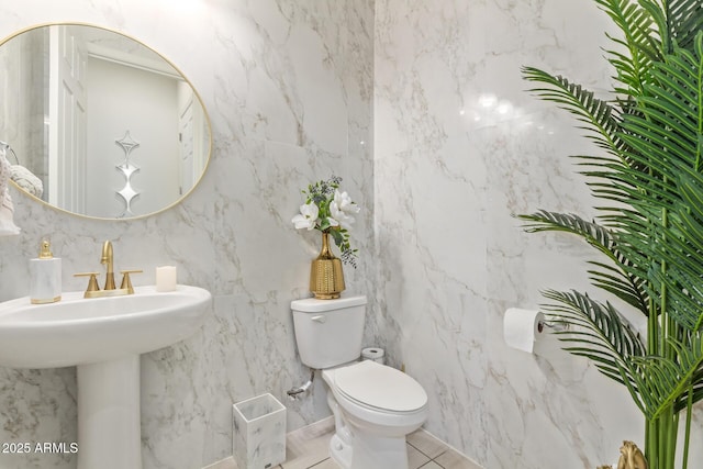 5218 N Tiller Dr, Litchfield Park, AZ 85340 - half bath featuring toilet, tile walls, and tile patterned flooring