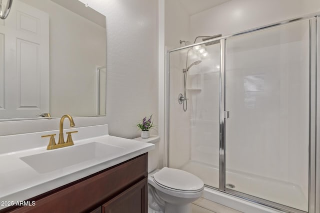 5218 N Tiller Dr, Litchfield Park, AZ 85340 - full bath with a stall shower, vanity, and toilet