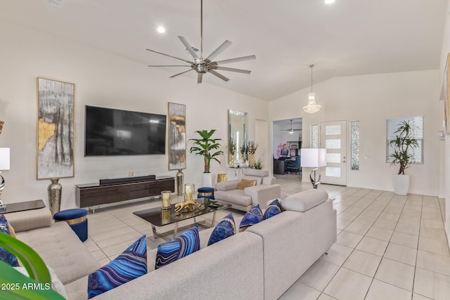5218 N Tiller Dr, Litchfield Park, AZ 85340 - tiled living room featuring a ceiling fan, vaulted ceiling, and recessed lighting