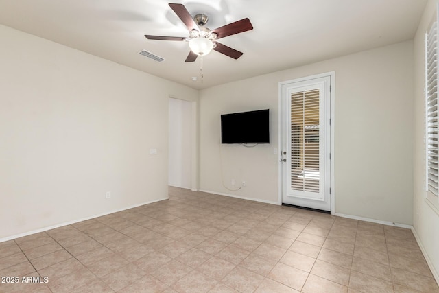 empty room featuring ceiling fan