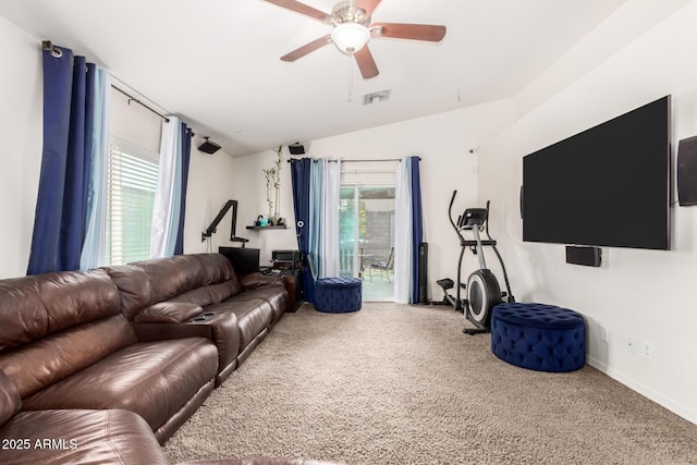 living room featuring ceiling fan, carpet flooring, and vaulted ceiling