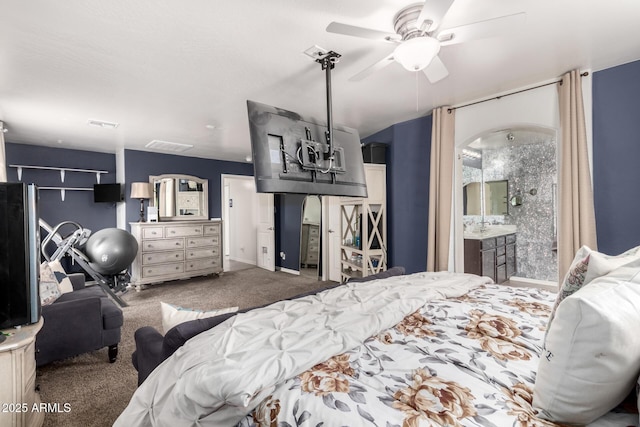 bedroom with ceiling fan and carpet