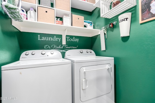 laundry room with washing machine and clothes dryer