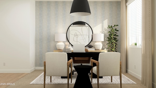 carpeted office featuring baseboards