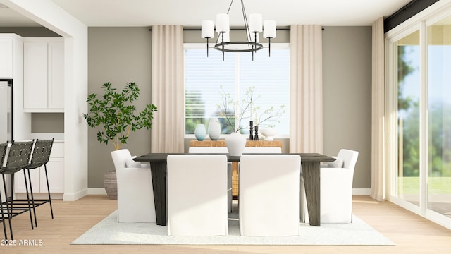 dining area featuring a wealth of natural light, a notable chandelier, light wood finished floors, and baseboards