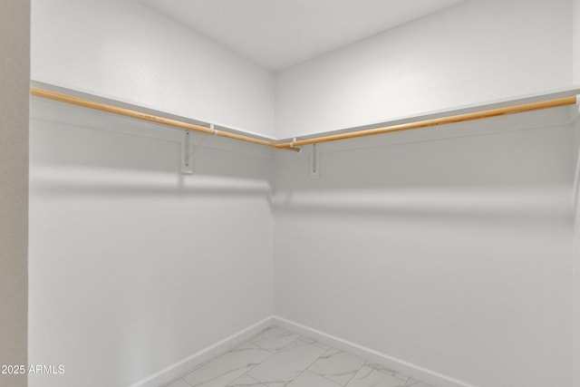 7607 N 42nd Ln, Phoenix, AZ 85051 - walk in closet with light marble finish flooring