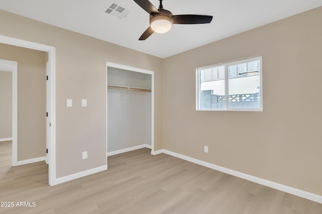 7607 N 42nd Ln, Phoenix, AZ 85051 - unfurnished bedroom with light wood-style floors, baseboards, a closet, and ceiling fan