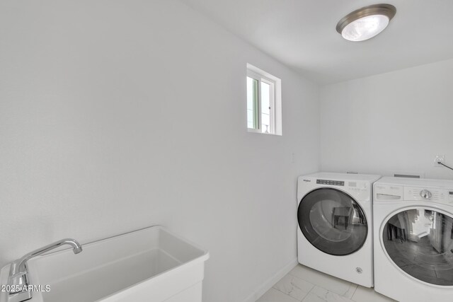 7607 N 42nd Ln, Phoenix, AZ 85051 - washroom featuring washing machine and dryer, light marble finish flooring, and baseboards
