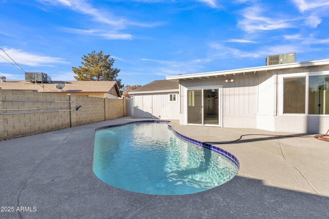 7607 N 42nd Ln, Phoenix, AZ 85051 - view of swimming pool with a fenced backyard, a patio, and central AC unit
