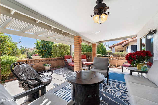 view of patio featuring an outdoor living space and a pergola