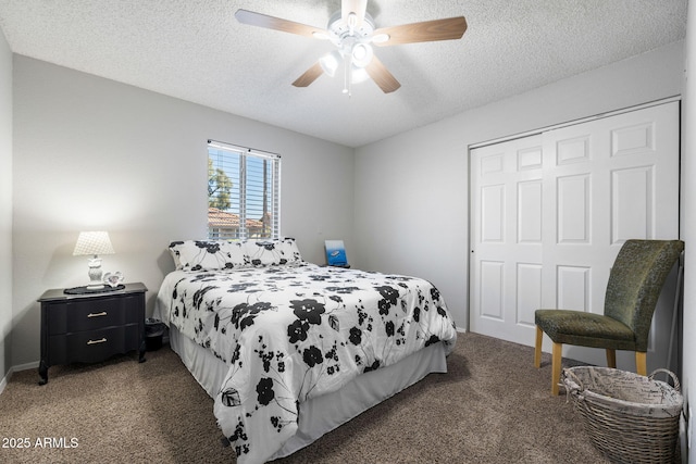 carpeted bedroom with ceiling fan, a textured ceiling, and a closet