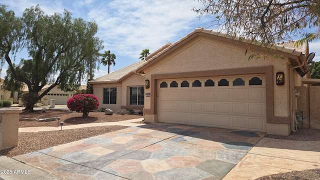 4010 N 156th Ln, Goodyear, AZ 85395 - ranch-style house with a tiled roof, driveway, a garage, and stucco siding