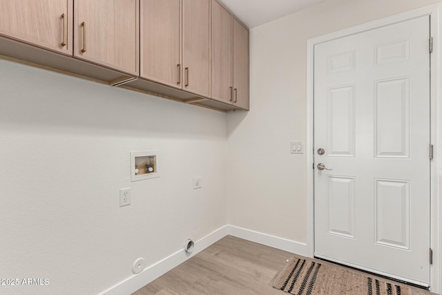 4010 N 156th Ln, Goodyear, AZ 85395 - clothes washing area featuring light wood-style flooring, baseboards, hookup for a washing machine, and cabinet space
