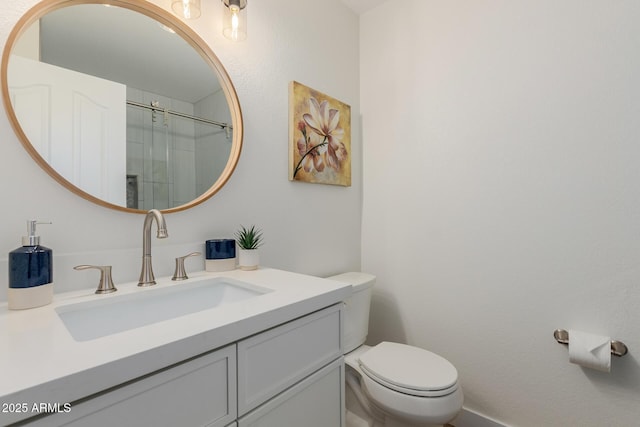 4010 N 156th Ln, Goodyear, AZ 85395 - bathroom with toilet, vanity, and a shower with shower door