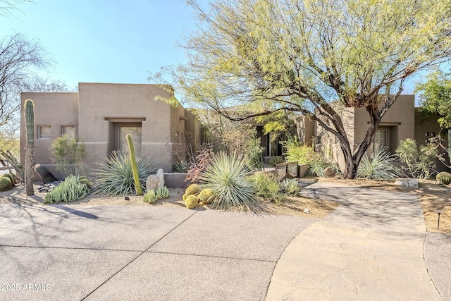 view of pueblo revival-style home