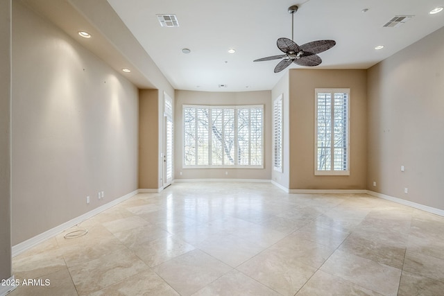 unfurnished room featuring ceiling fan