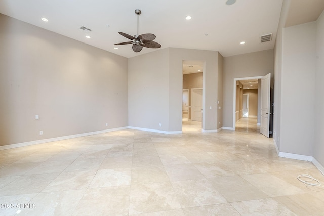 spare room with ceiling fan