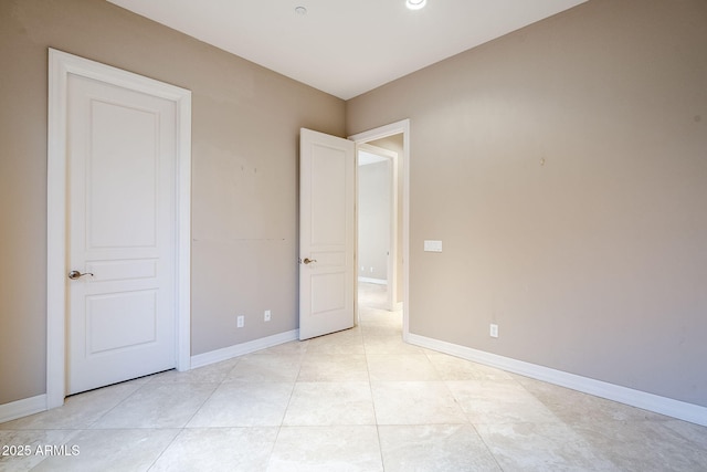 unfurnished bedroom featuring light tile patterned floors