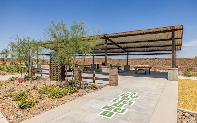 surrounding community with shuffleboard and a gazebo