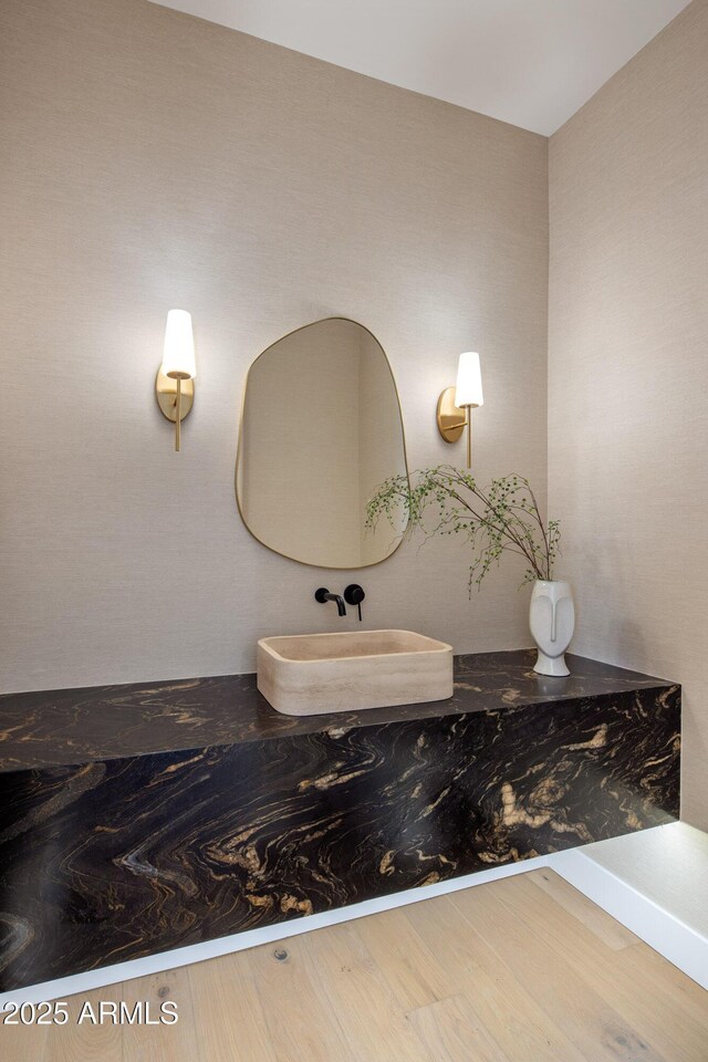13631 E Windrose Dr, Scottsdale, AZ 85259 - bathroom featuring a sink and wood finished floors