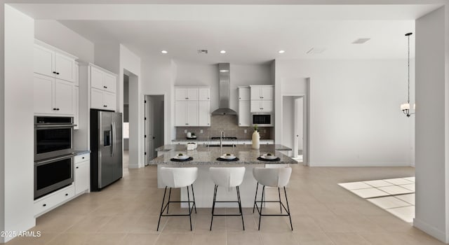 27908 N 38th Dr, Phoenix, AZ 85083 - kitchen with wall chimney exhaust hood, stainless steel appliances, white cabinets, and tasteful backsplash