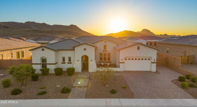 27908 N 38th Dr, Phoenix, AZ 85083 - mediterranean / spanish home featuring fence, stucco siding, a tile roof, driveway, and a garage