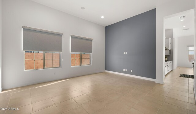 27908 N 38th Dr, Phoenix, AZ 85083 - empty room featuring recessed lighting, plenty of natural light, visible vents, and light tile patterned floors