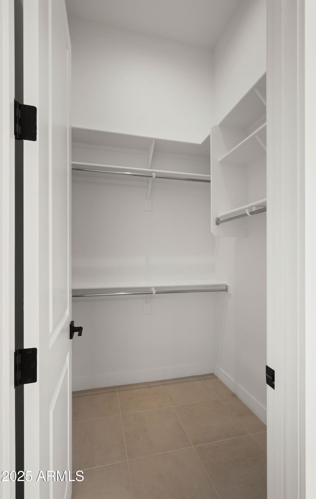 27908 N 38th Dr, Phoenix, AZ 85083 - spacious closet featuring tile patterned floors