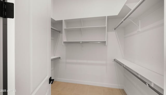27908 N 38th Dr, Phoenix, AZ 85083 - walk in closet with light tile patterned floors