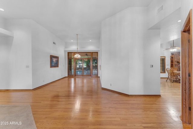8604 S Oak St, Tempe, AZ 85284 - unfurnished living room with light wood finished floors, ceiling fan, and recessed lighting