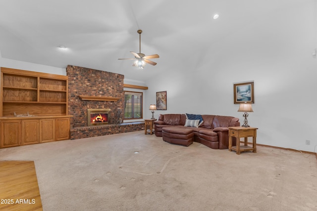 8604 S Oak St, Tempe, AZ 85284 - carpeted living area with a ceiling fan, a fireplace, and vaulted ceiling