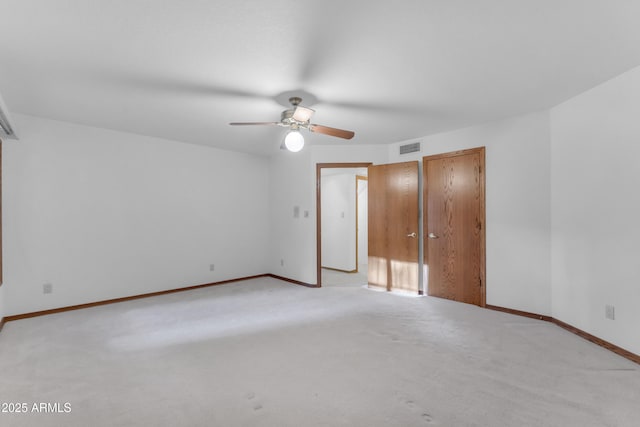 8604 S Oak St, Tempe, AZ 85284 - unfurnished bedroom featuring light colored carpet and ceiling fan