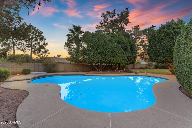 8604 S Oak St, Tempe, AZ 85284 - pool at dusk with a fenced backyard and a diving board