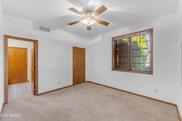 8604 S Oak St, Tempe, AZ 85284 - unfurnished bedroom with carpet, a ceiling fan, and ensuite bathroom