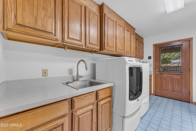 8604 S Oak St, Tempe, AZ 85284 - laundry area featuring cabinet space, washer and dryer, and light tile patterned floors